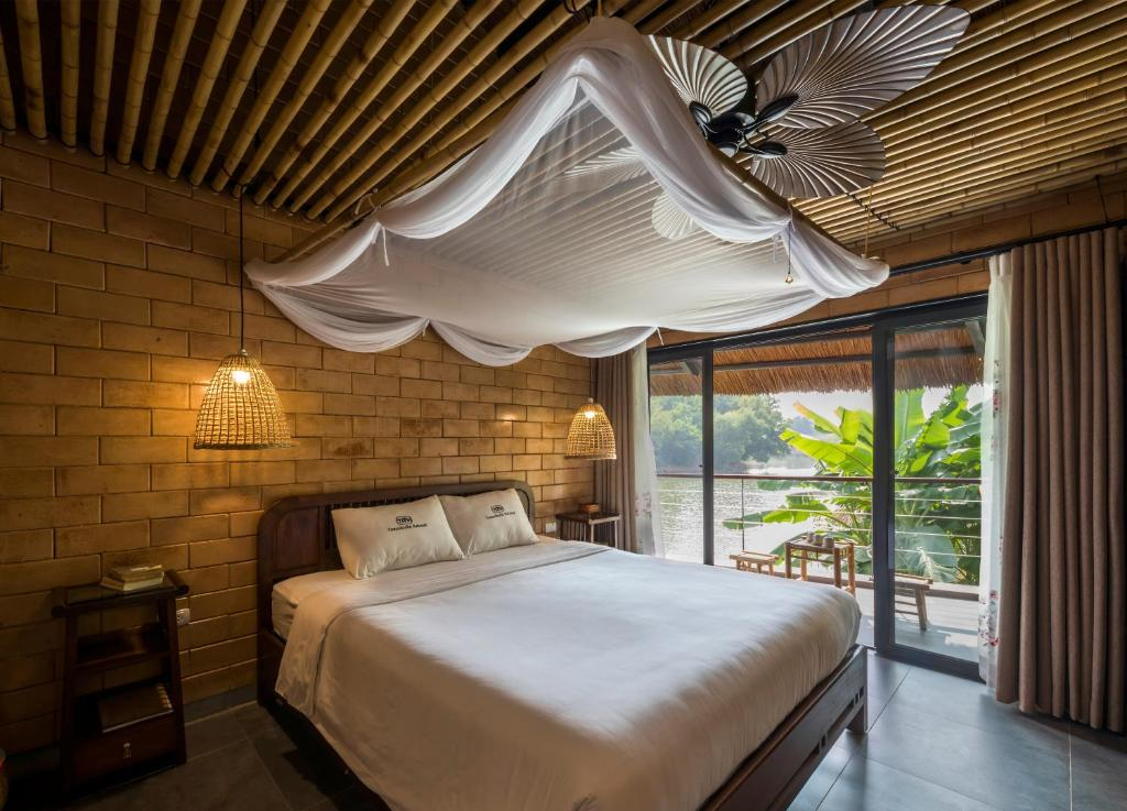 Làng Mít Tomodachi Resort gần Hà Nội có hệ thống phòng nghỉ được thiết kế theo phong cách nhà sàn
